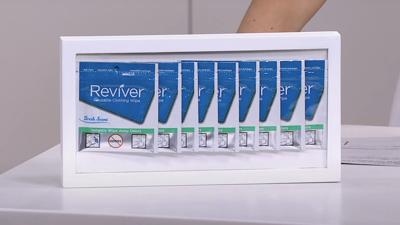 display of Reviver clothing wipes