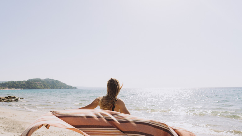 woman holding a towel