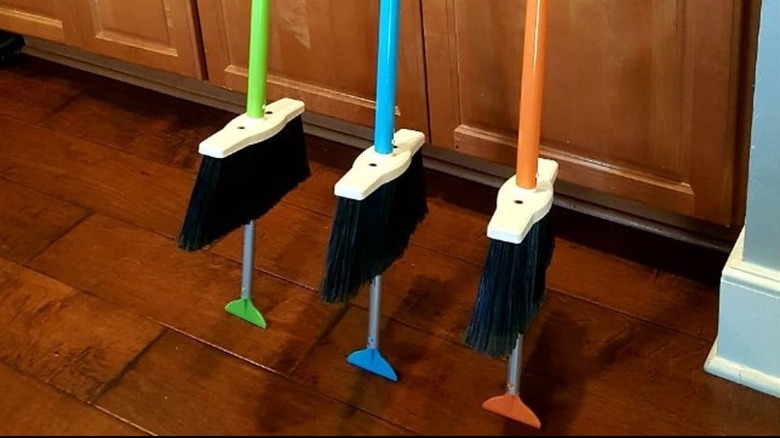 Three SweepEasy broom scrapers