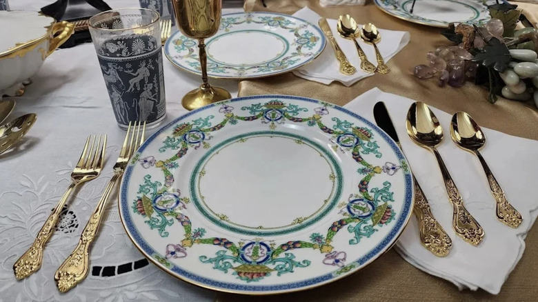 Minton dinner plate setting on a table