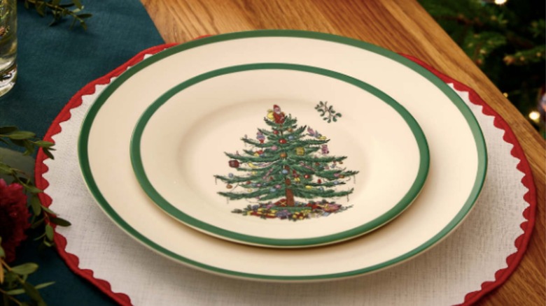Spode Christmas Tree plates on a table set for a holiday gathering