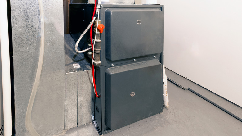 A furnace located in the basement of a home