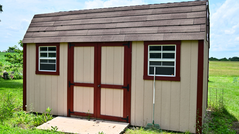 Wooden storage shed in a yard