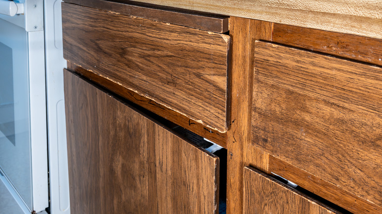 Damaged old kitchen cabinets