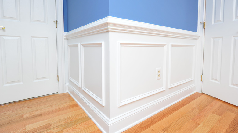 Wainscoting on blue wall