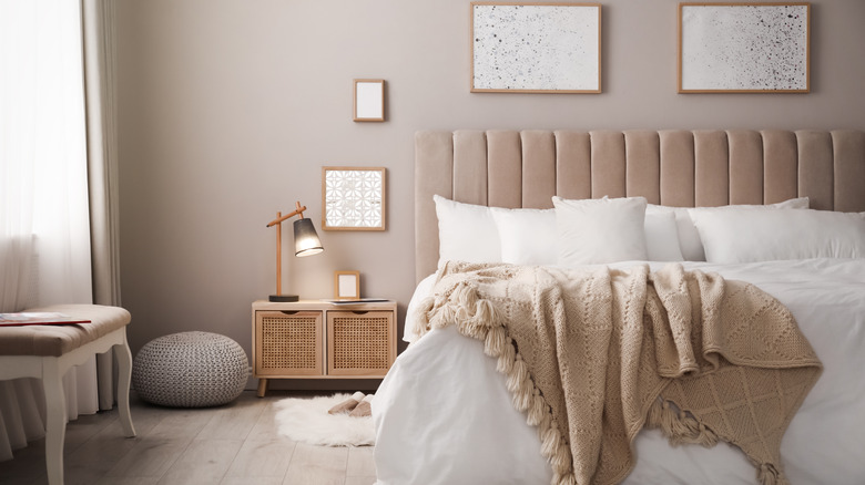 Neutral bedroom with bedside lamp