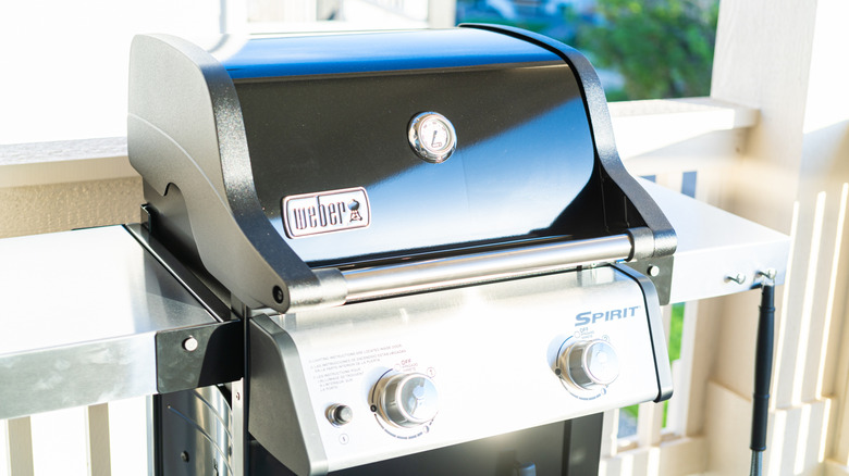 Weber gas grill on a deck