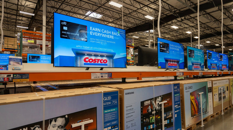 The Costco TV section with several different models on display