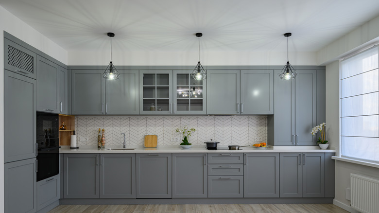 Kitchen with gray cabinets