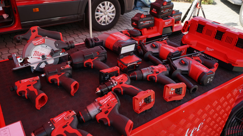 A row of Milwaukee power tools