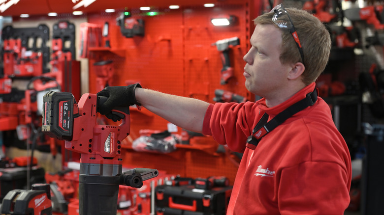 Sales person at a Milwaukee tool display