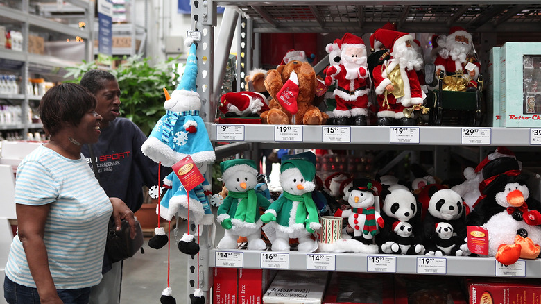 Couple looking at Christmas decor