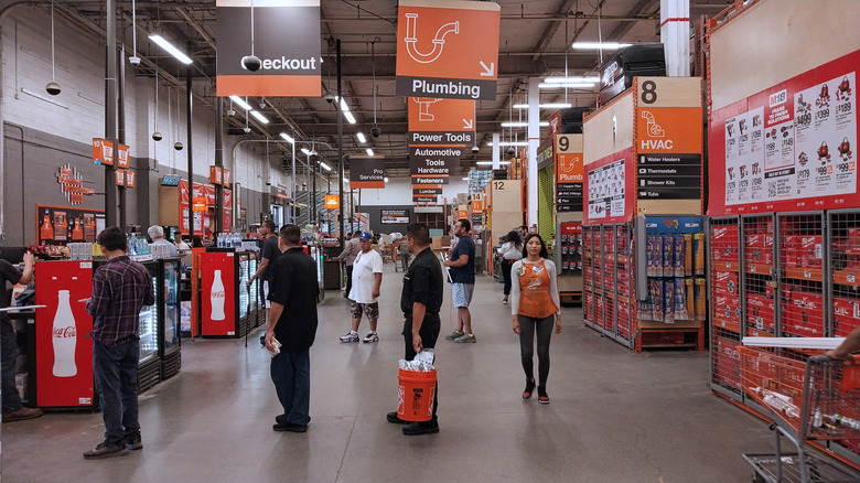 People checking out with their purchases at Home Depot