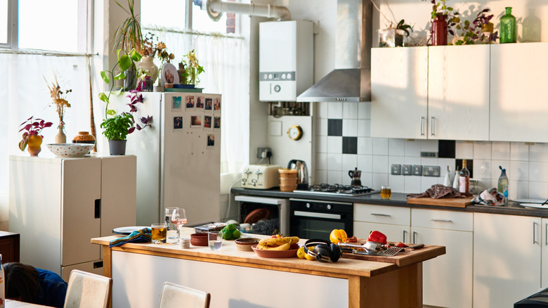 A modern kitchen space with a tile backsplash