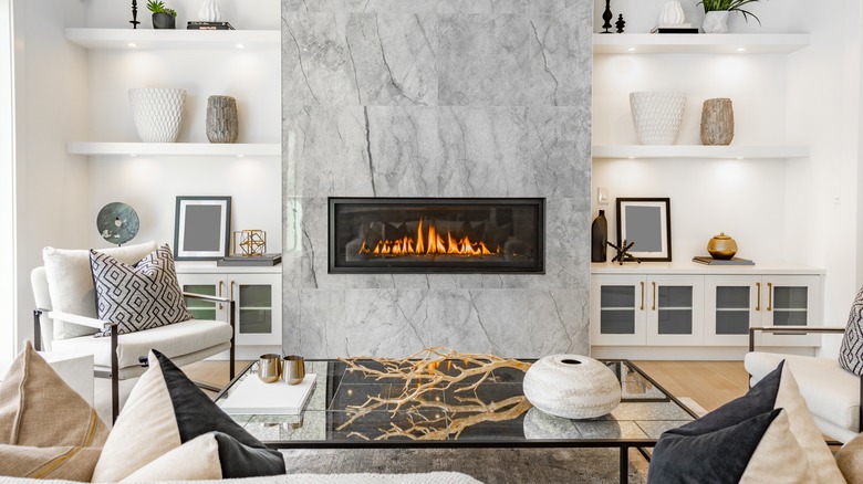 white and gray living room with fireplace