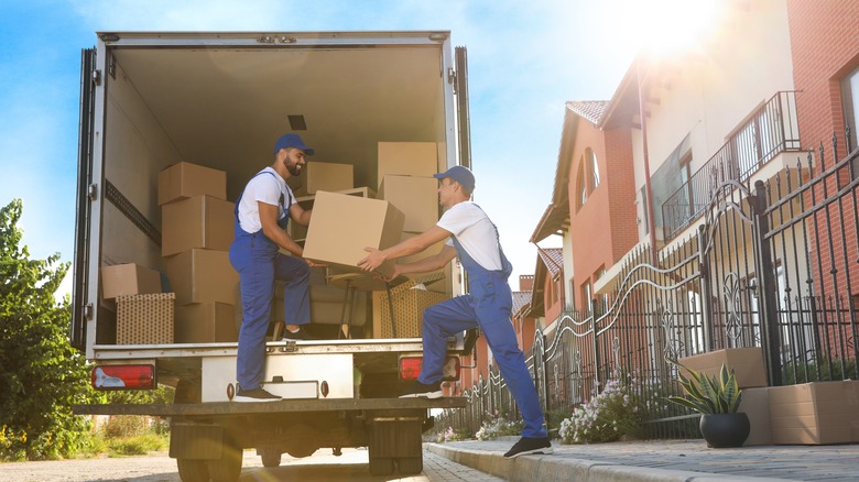 People loading a moving truck