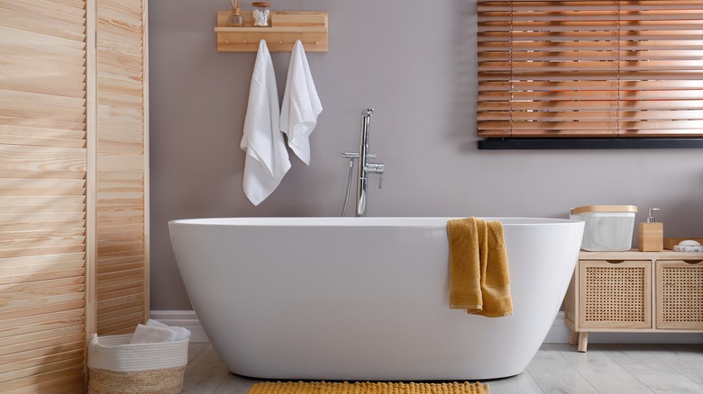 bathtub in gray bathroom