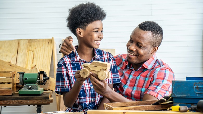 Father and son doing crafts