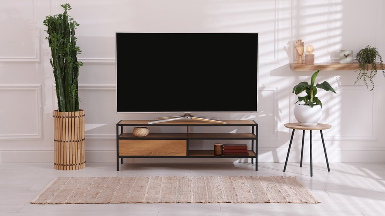 Metal frame stand with shelves