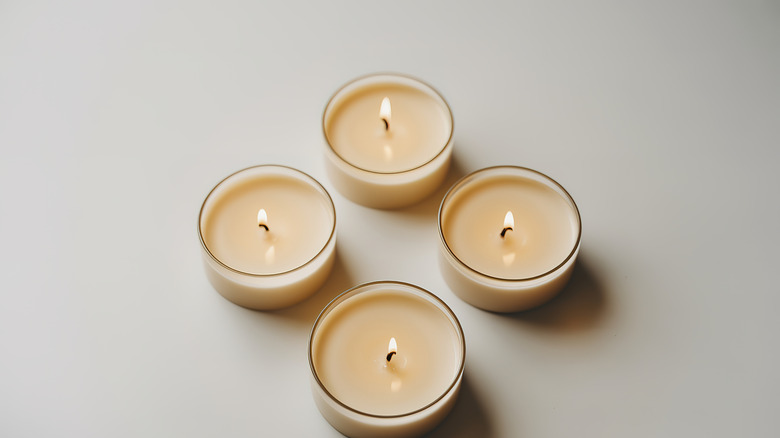 Paraffin candle wax on door hinge