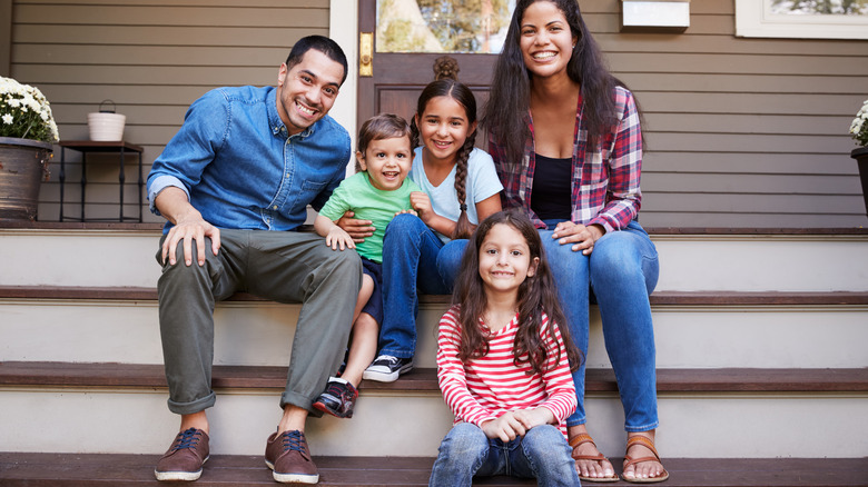 Family sitting on porch