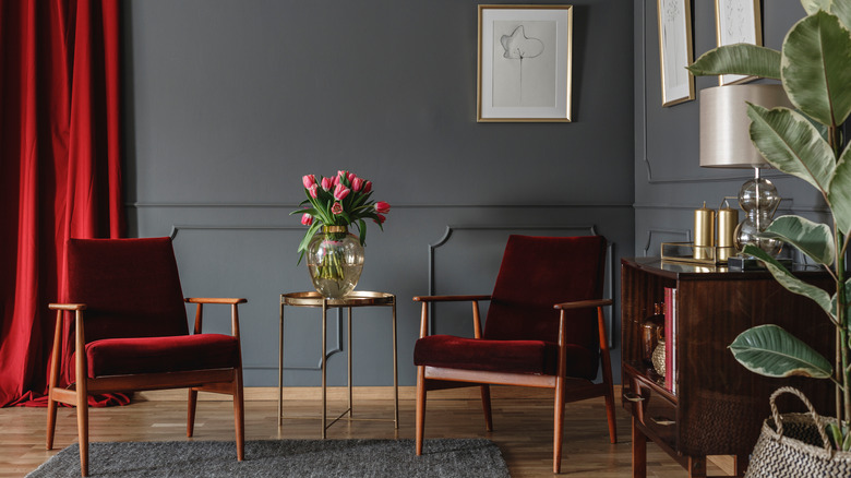 Gray wall with red curtains