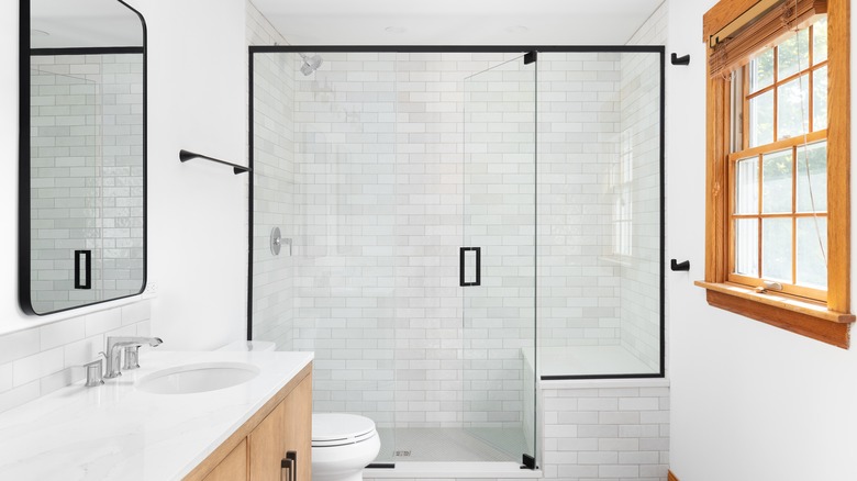 bathroom with glass shower doors