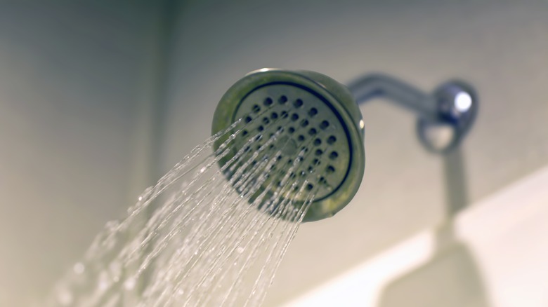 Water flowing out of a shower head