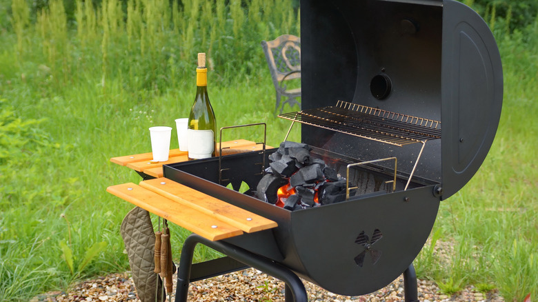 black charcoal grill with wine