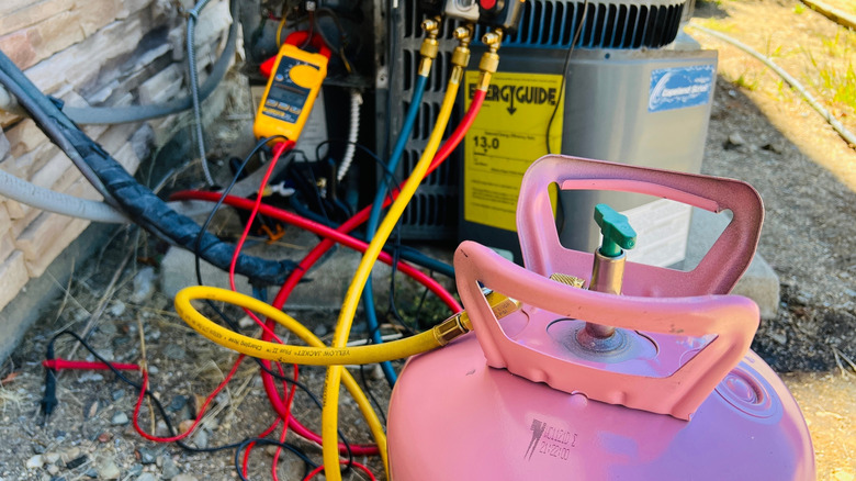 Adding refrigerant to an outdoor AC unit