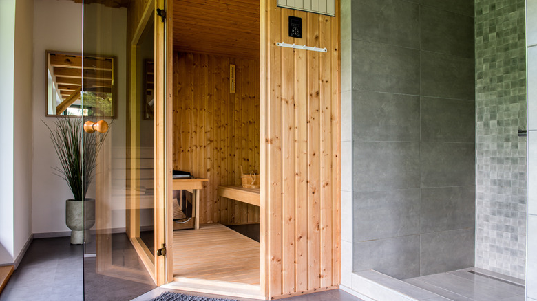 A home sauna installed next to a shower