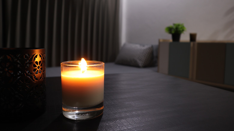 scented candle dark background