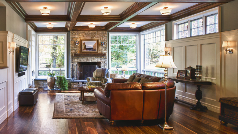 A living room with a fireplace in a period home