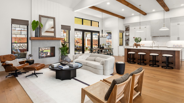 An open concept space with the kitchen and living room close to each other