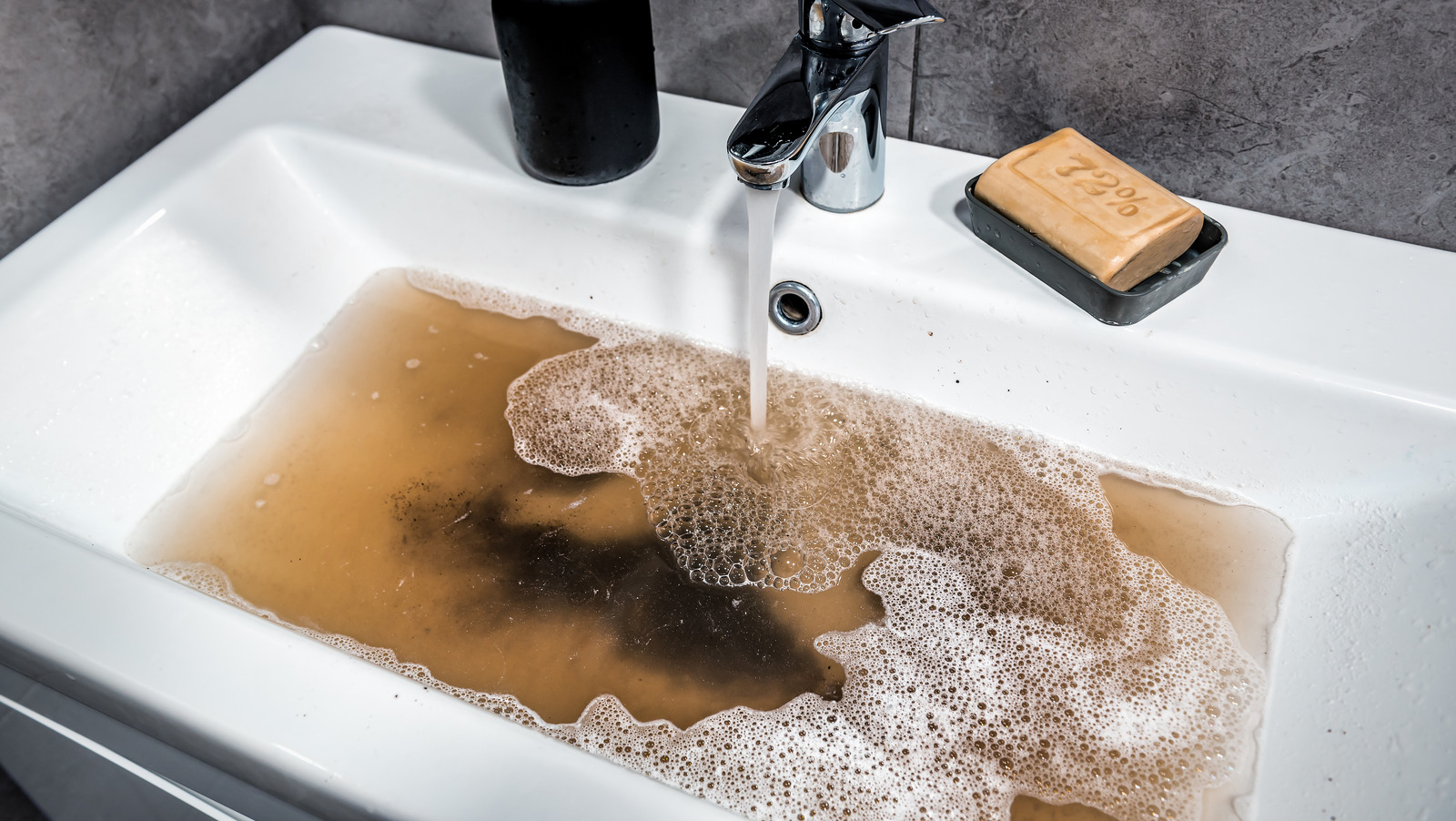 Why Dish Soap Is Your Unexpected Secret Weapon For Clogged Drains