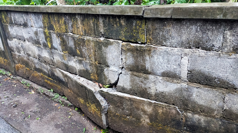 Heavily damages retaining wall