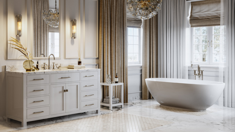 a sophisticated bathroom with white marble