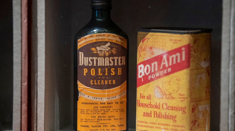 Two vintage cleaners on self.