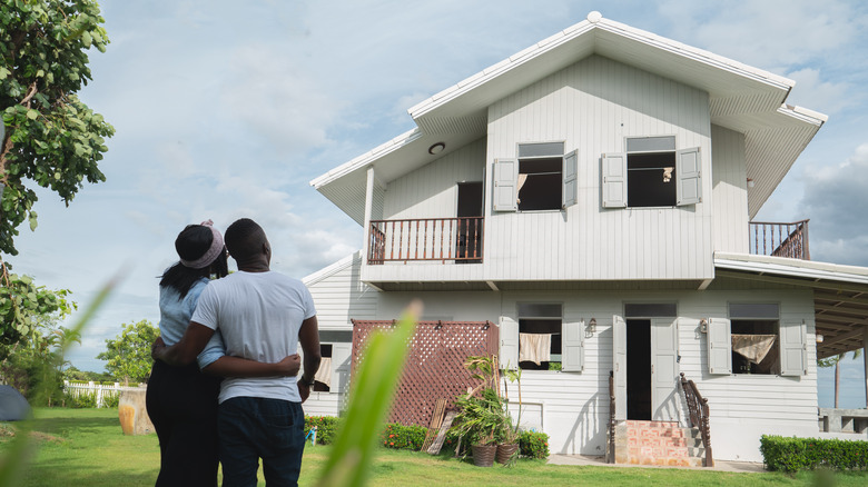 couple looking at house