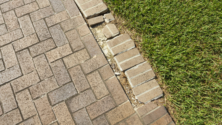 Broken and shifted patio pavers