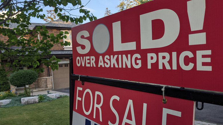 Sold over asking price sign
