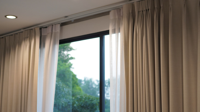 Drapery layered with sheer fabric