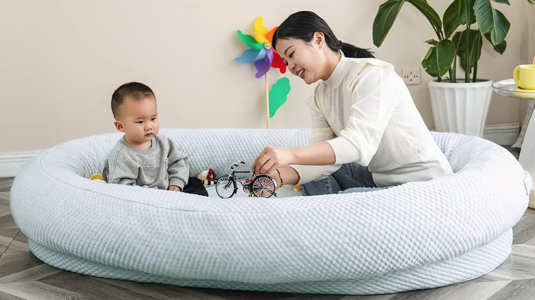 woman and child playing