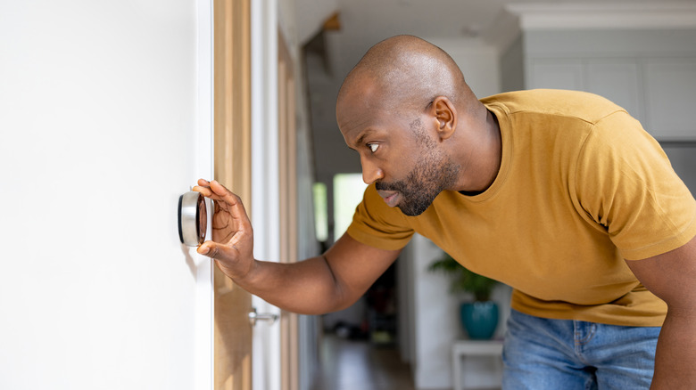 man working AC unit