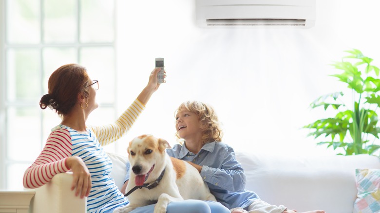 woman working AC unit