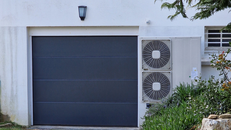 Heat pump attached to a garage