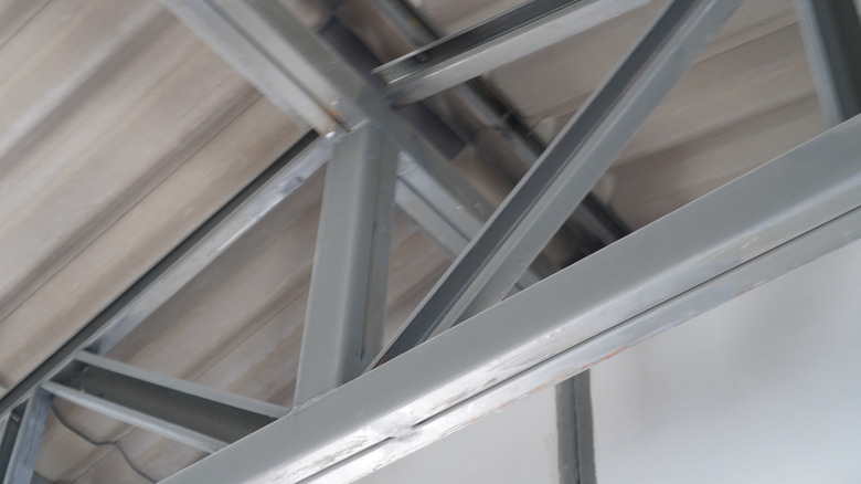 Steel beams supporting a roof.