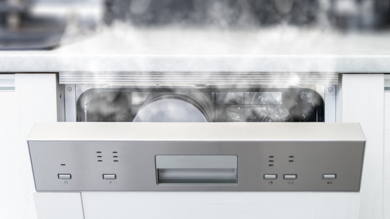 steam coming from open dishwasher