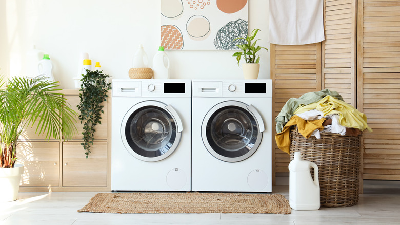 A washing machine and a dryer in a laundry room