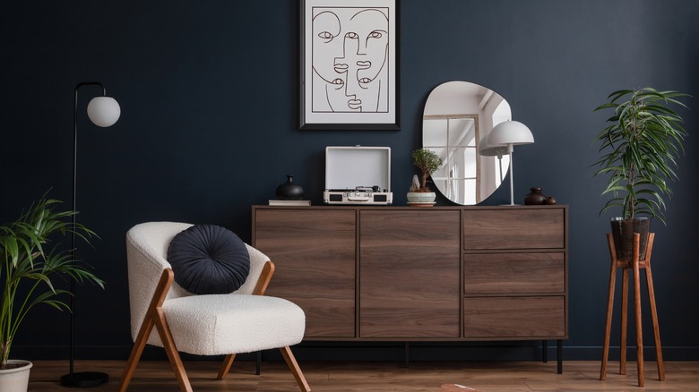 black wall behind furniture